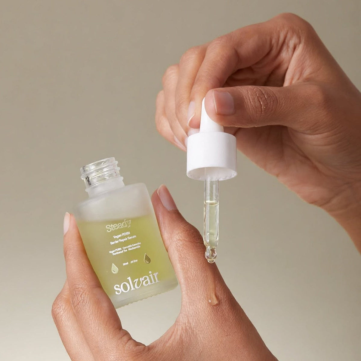 Applying a small drop of STEADY serum to the wrist